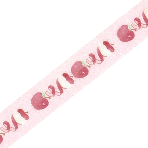 Decorative ribbon with red apple and leaf pattern on a pink background