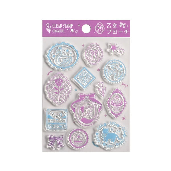 Set of clear stamps with various designs on a purple card