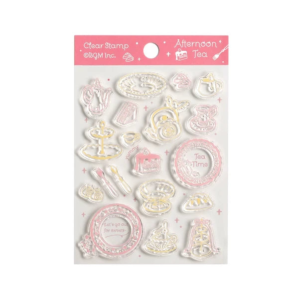 Clear stamp set with tea-themed designs on a pink background