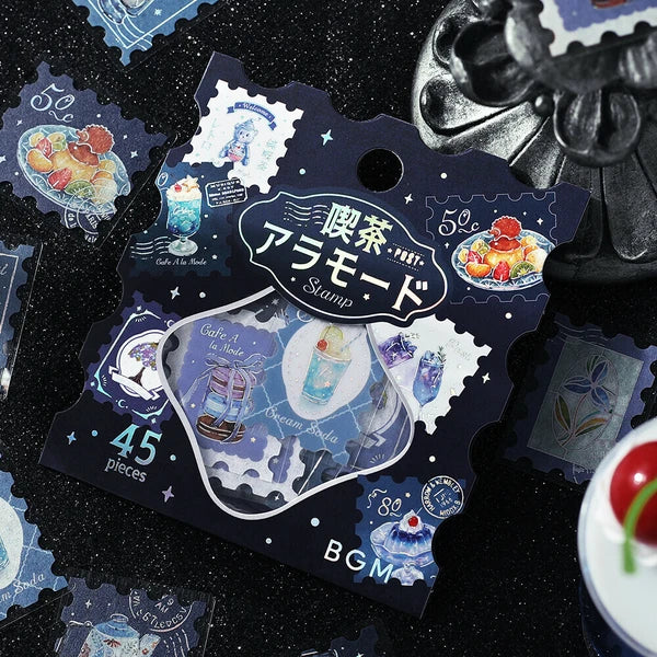 Decorative packaging with Japanese text and illustrations on a dark background