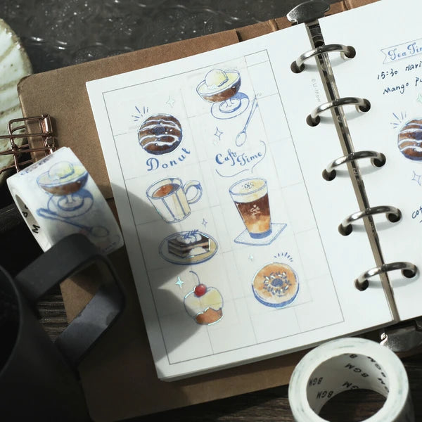 Sticker sheet with food and drink illustrations in a planner