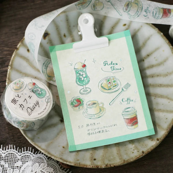 Stationery set with a card and washi tape on a ceramic plate