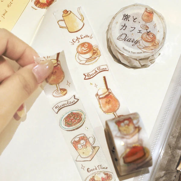Sticker sheet with coffee-themed designs held by a hand