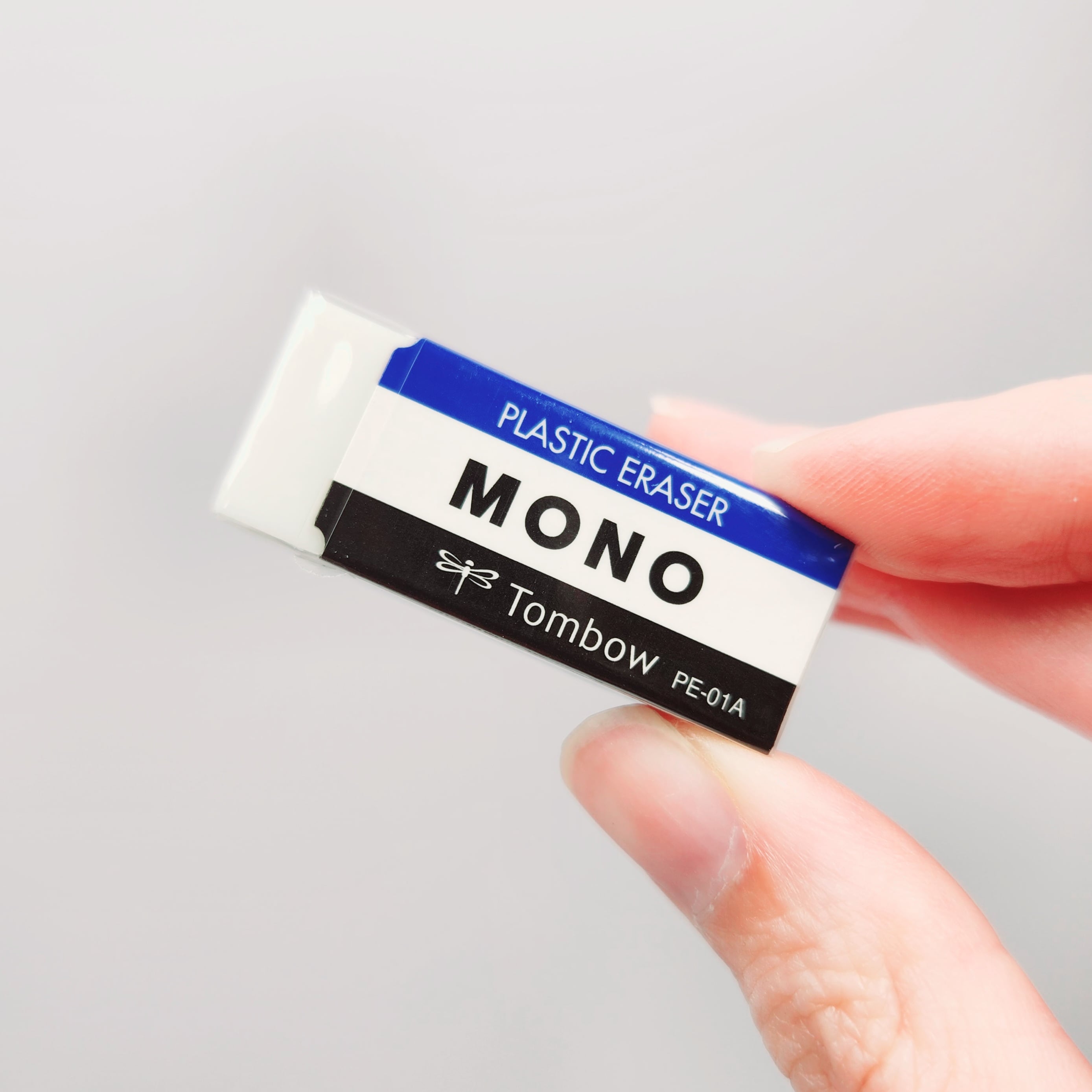 Tombow Mono Plastic Eraser PE01A size compared to hand - Paper Kooka Australia